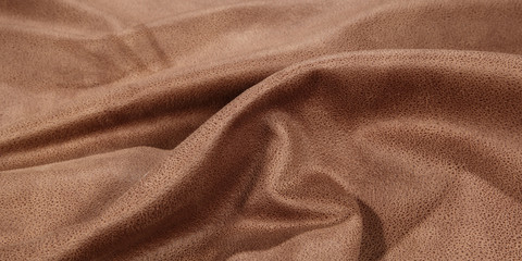 Brown wrinkly textile material woven cloth