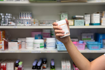 Hand holding remedy. Medicine.