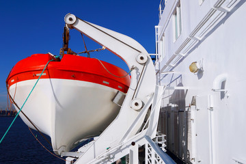 Cruise liner. Lifeboat. Voyage.