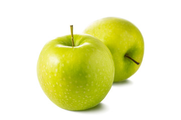 Two fresh green apple isolated on white background.