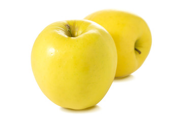 Two fresh yellow apple isolated on white background.
