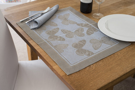 Rectangular Placemat with Embroidered Butterfly Design Laid on T