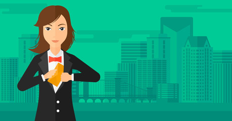 Woman putting envelope in pocket.