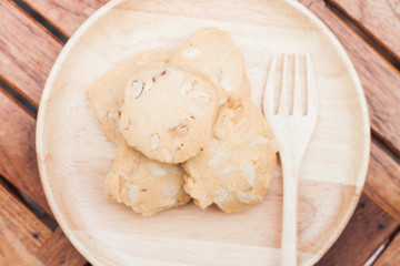 Cashew cookies on wooden plate