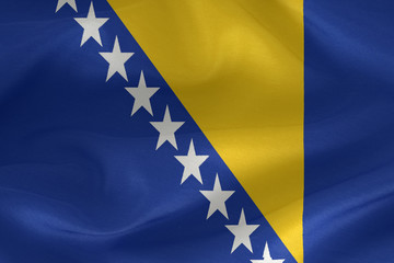 Bosnia and Herzegovina flag pattern on the fabric texture
