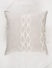 Close Up of Square Gray Throw Pillow on White Backdrop