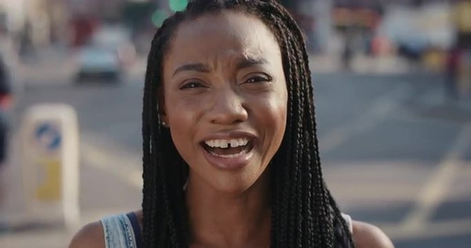Slow Motion Portrait of beautiful African American woman laughing