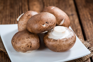 Mushrooms (selective focus) on wood