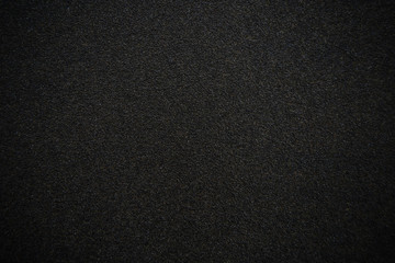 Black sandpaper texture - obrazy, fototapety, plakaty