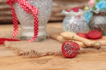 Chia seeds with milk and fresh strawberries.