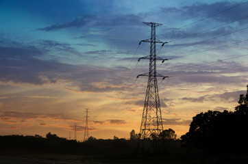 Fototapeta premium Silhouette of high voltage post