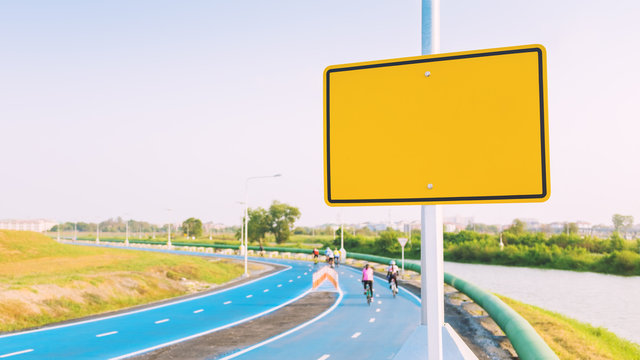 Blank Yellow Billboard On Bike Lane (vintage Tone).