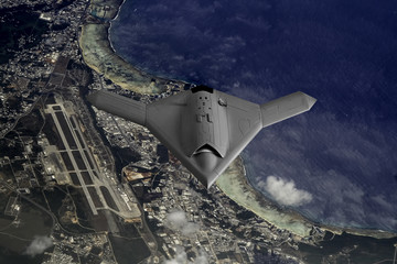 Unmanned Drone flying high over the island of Guam