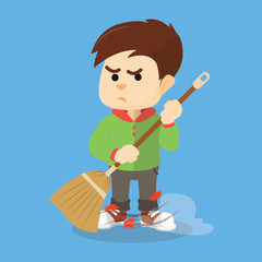 Boy sweeping with his broom