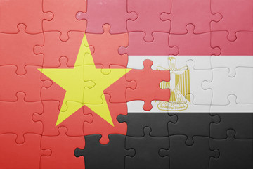 puzzle with the national flag of vietnam and egypt.
