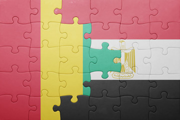 puzzle with the national flag of guinea and egypt.