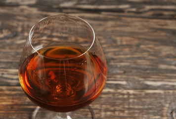 Cognac, brandy or whiskey in large round glass