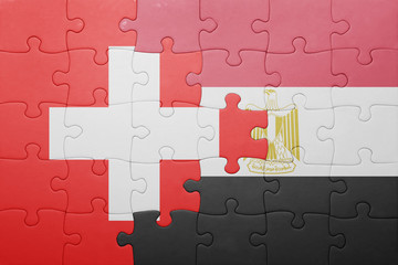 puzzle with the national flag of switzerland and egypt