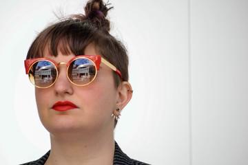 Head-shot Young White Female Wearing Sunglasses, White Background