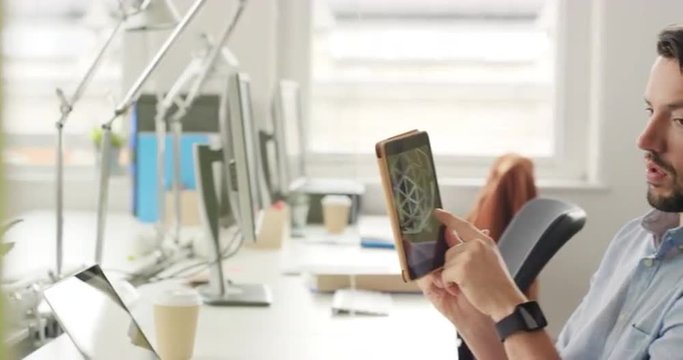 Female engineer showing 3d printed object in Creative business team meeting in modern start up office team leader pointing at screen discussing geodesic dome shape