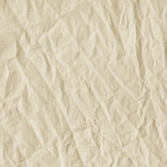 Fototapeta na wymiar Beige canvas with delicate striped pattern, crumpled.