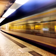 Fototapeta premium train passing by in railway station
