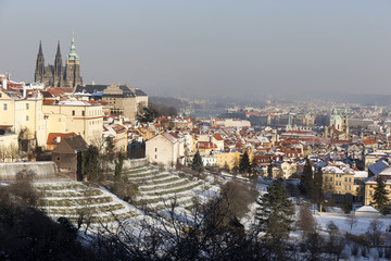 Romantic snowy  Prague City with gothic Castle, Czech Republic