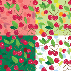 Red cherries with green leaves on green, pink, white backgrounds