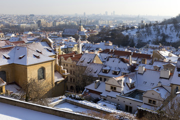Fototapeta premium Romantic snowy Prague City in the sunny Day, Czech Republic