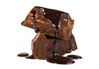 Slices dark chocolate bar poured chocolate isolated on white bac