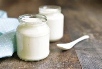 Homemade yogurt in a glass jar.