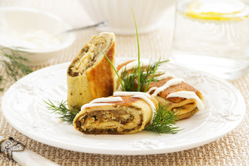 Pancakes stuffed with liver and eggs.