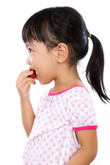Asian Little Chinese Girl Eating Strawberry