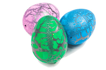 Toy Dinosaur egg for Easter isolate on white
