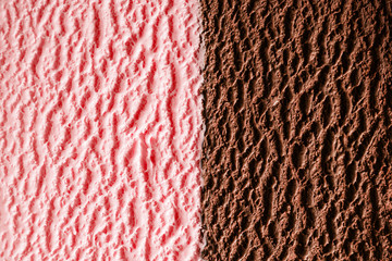 Strawberry and fudge ice cream close up