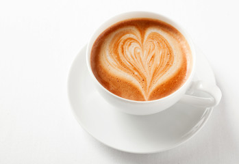 Decorative cup of cappuccino coffee