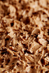 Sweet and tasty chocolate cake background, close up