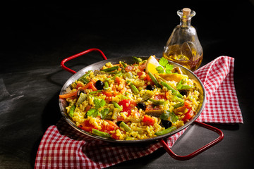 Healthy serving of paella verduras with asparagus