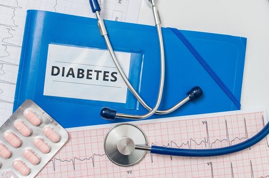 Blue Folder With Diabetes Diagnosis And Stethoscope.