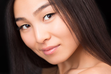 Obraz premium Close-up of face of Asian lady