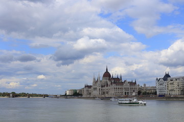 Fototapeta na wymiar Budapest, Hungarian Parliament with boat on the Danube