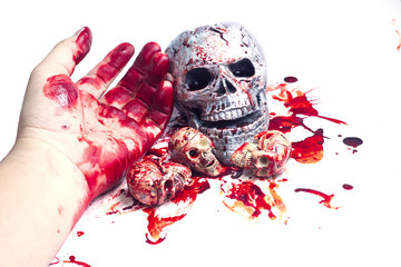 skull Conceptual image with blood on it resting on tiles on the floor