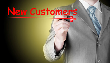 businessman writing new customers