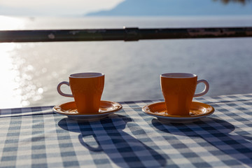 Two mugs of coffee on the table