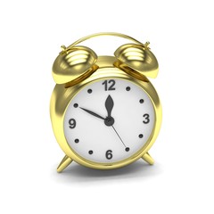 Gold alarm clock on white