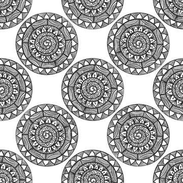 Seamless pattern with black and white mandala. Coloring book page background.