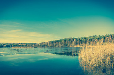 Vintage landscape of lake.