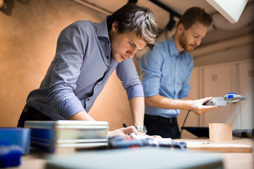 Fototapeta premium Joiners working in workshop