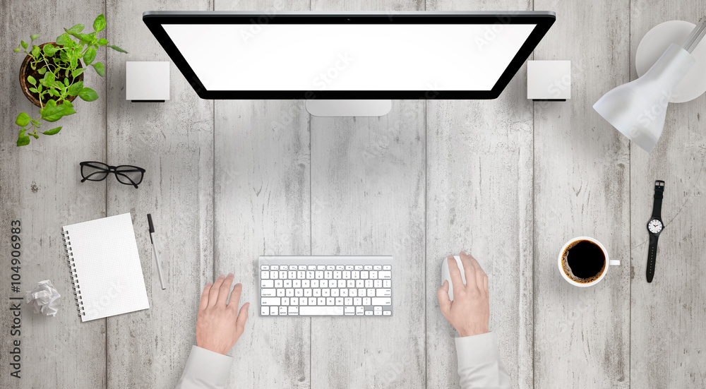Aufkleber Modern desk with isolated computer display top view. Designer works with a mouse and keyboard. Coffee, lamp, paper, glasses, plant, watch on table.