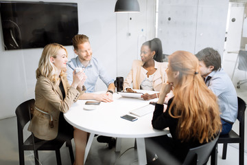 Group of business people sitting at desk